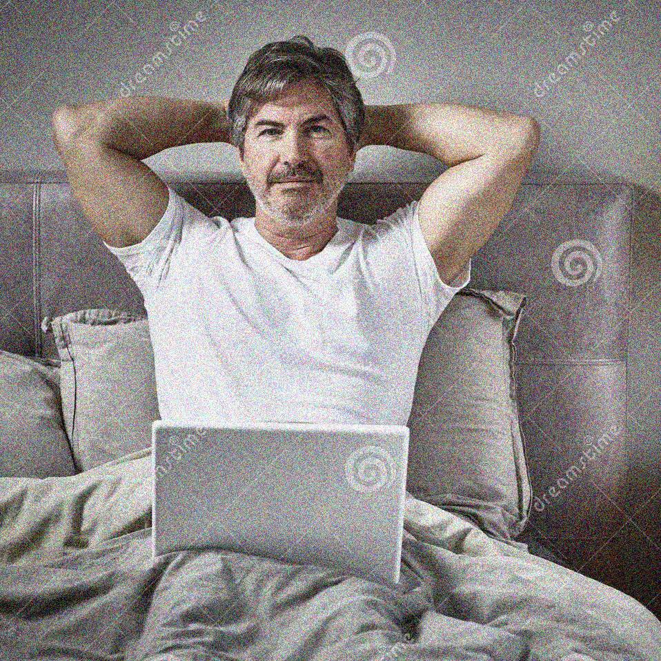 Josh relaxing in bed and definitely not a stock image